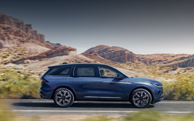 A 2024 Lincoln Nautilus® SUV is being driven in a desert setting. | Gettel Lincoln in Punta Gorda FL