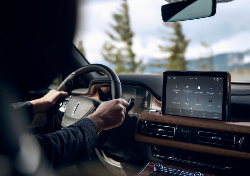 The Lincoln+Alexa app screen is displayed in the center screen of a 2023 Lincoln Aviator® Grand Touring SUV | Gettel Lincoln in Punta Gorda FL