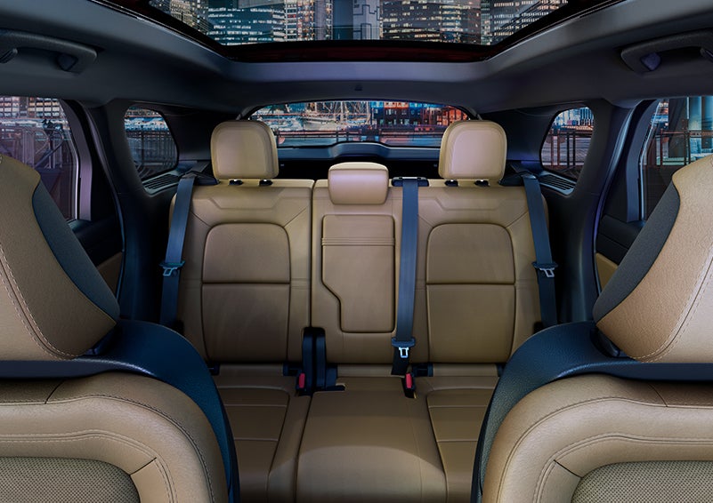 The spaciousness of the second row of the 2023 Lincoln Corsair® SUV is shown. | Gettel Lincoln in Punta Gorda FL