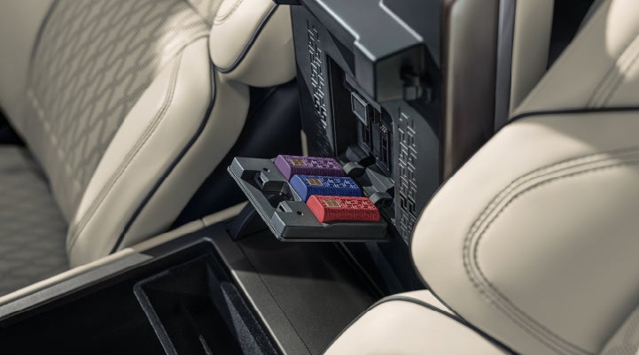 Digital Scent cartridges are shown in the diffuser located in the center arm rest. | Gettel Lincoln in Punta Gorda FL