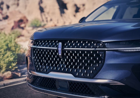 The stylish grille of a 2024 Lincoln Nautilus® SUV sparkles in the sunlight. | Gettel Lincoln in Punta Gorda FL